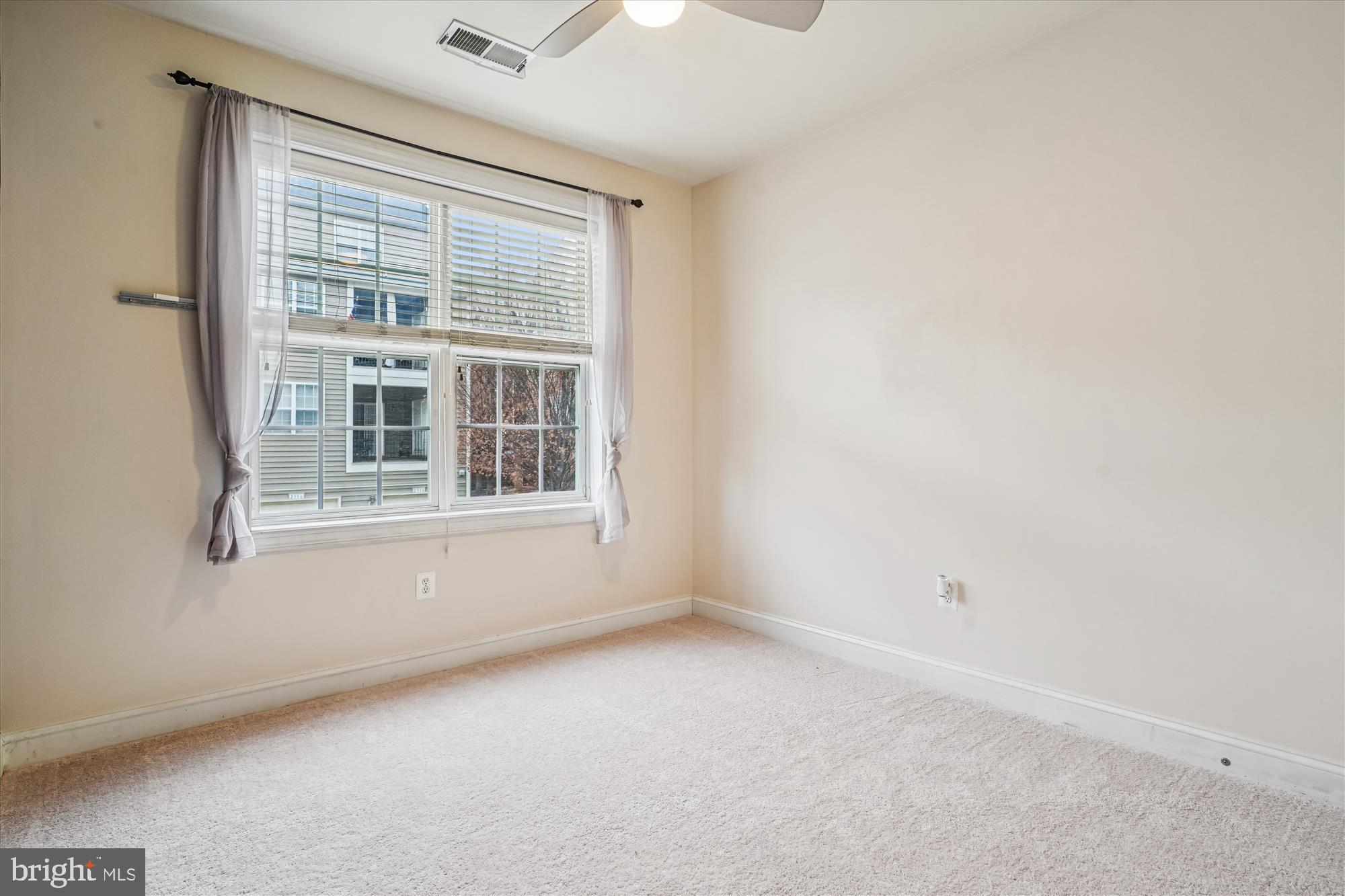 2675 Sheffield Hill Way, Unit 164 Woodbridge, VA 22191 - Photo 13 of 37 a view of empty room with windows
