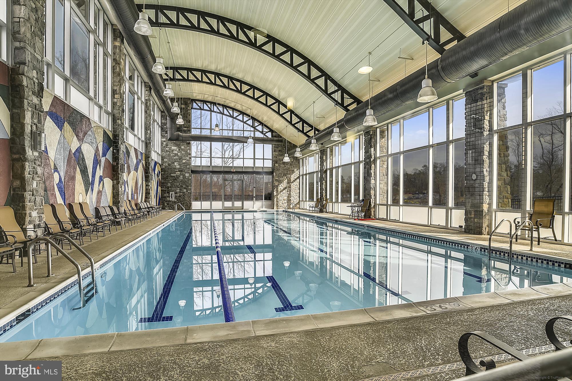 2675 Sheffield Hill Way, Unit 164 Woodbridge, VA 22191 - Photo 23 of 37 a view of a swimming pool with a balcony