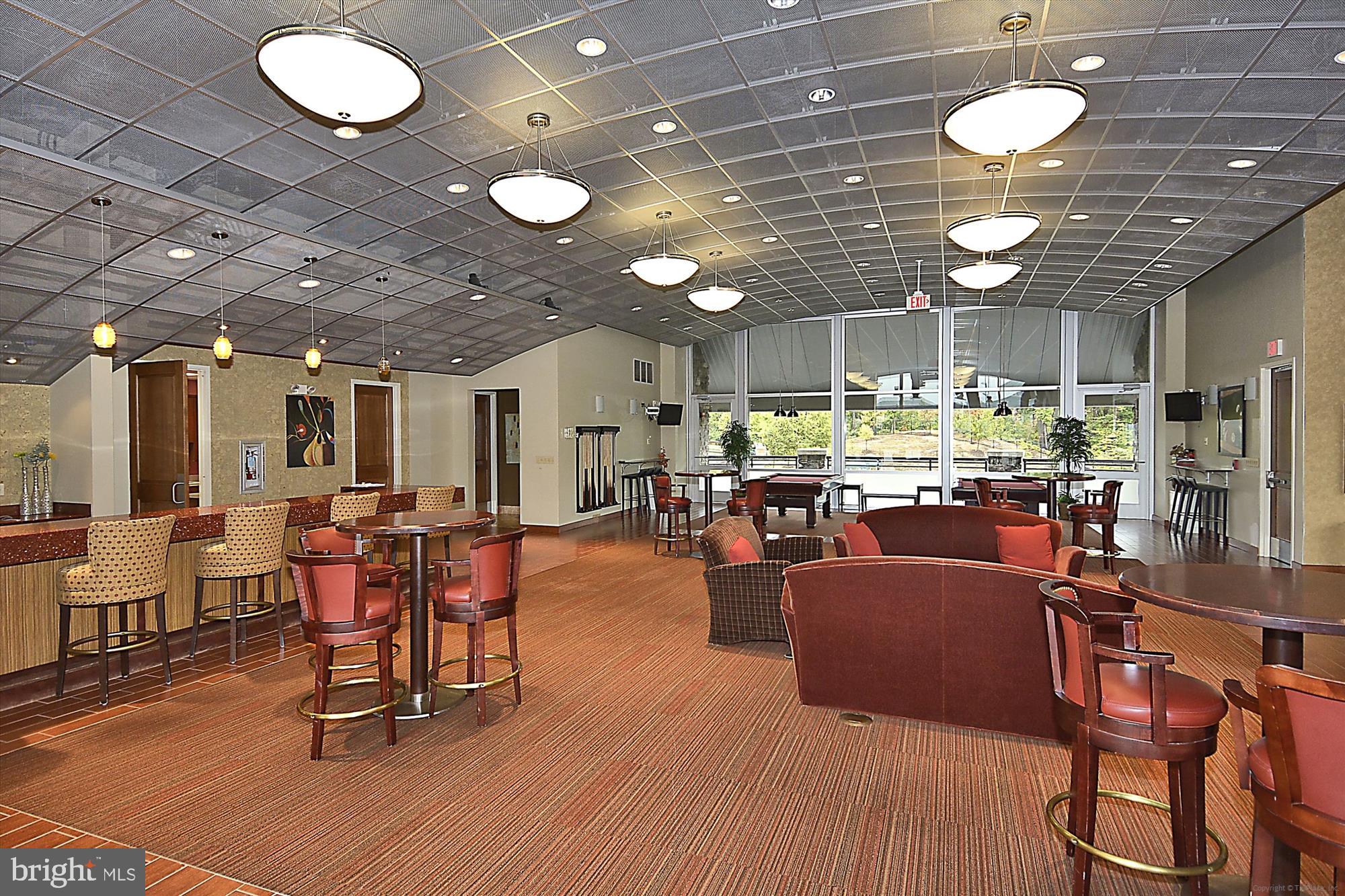 2675 Sheffield Hill Way, Unit 164 Woodbridge, VA 22191 - Photo 27 of 37 a view of a dining room with furniture