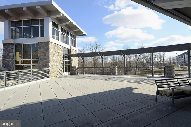 a view of a street with a building in the background