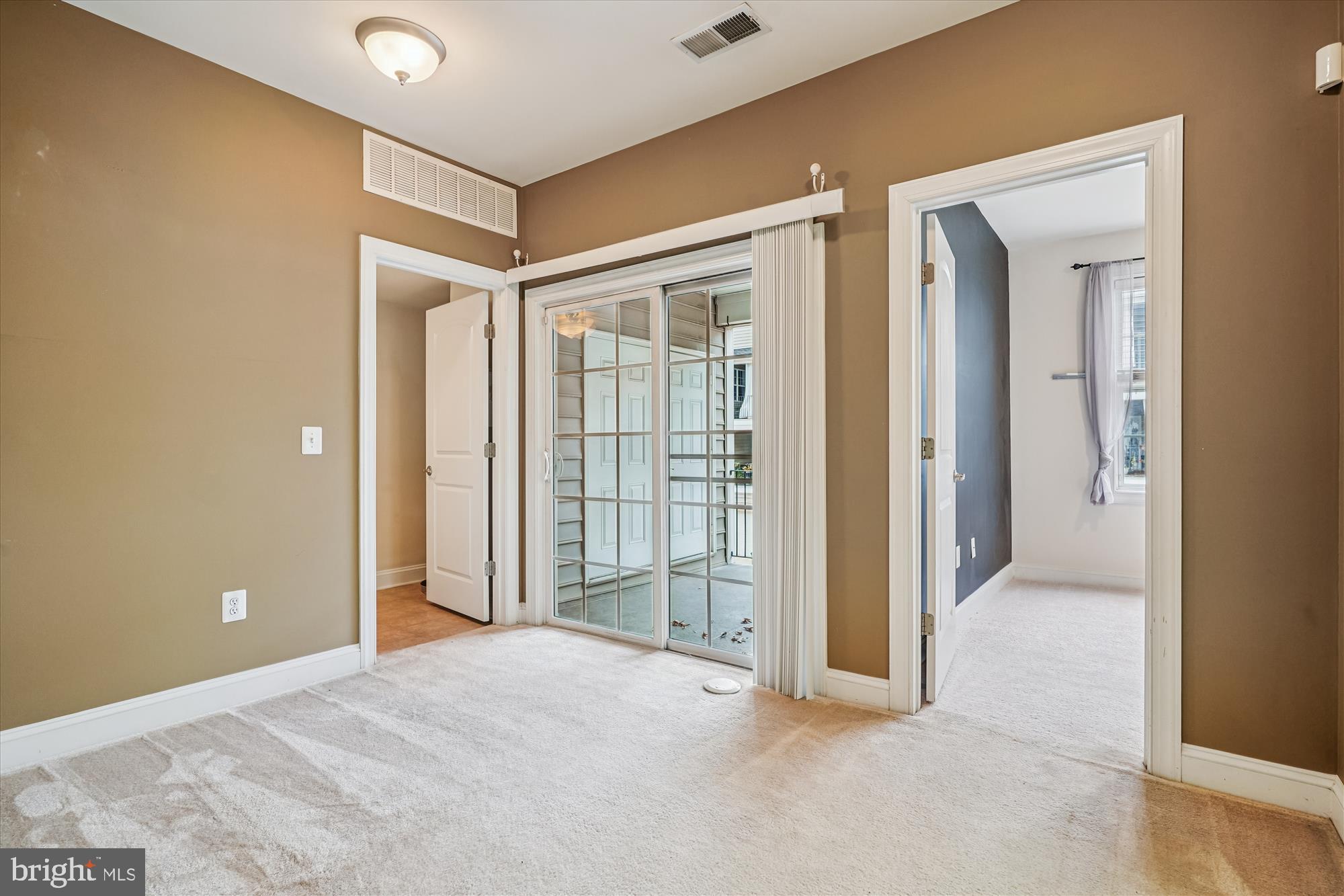 2675 Sheffield Hill Way, Unit 164 Woodbridge, VA 22191 - Photo 8 of 37 an empty room with windows