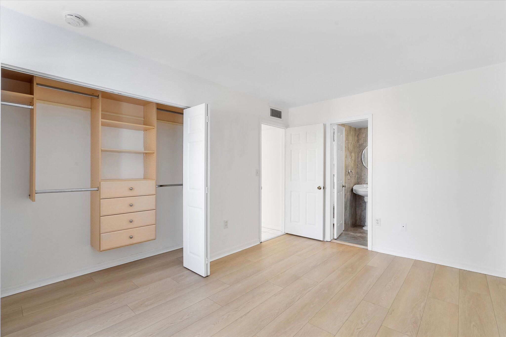 2138 Southwest 6th Street, Unit 301 Miami, FL 33135 - Photo 12 of 15 wooden floor in an empty room