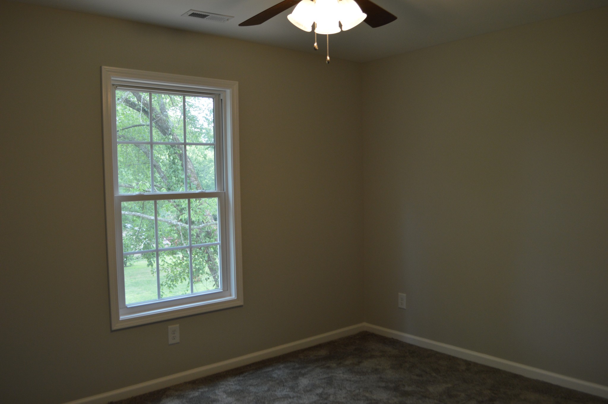 7713 South Swift Road Goodlettsville, TN 37072 - Photo 12 of 18 an empty room with a window