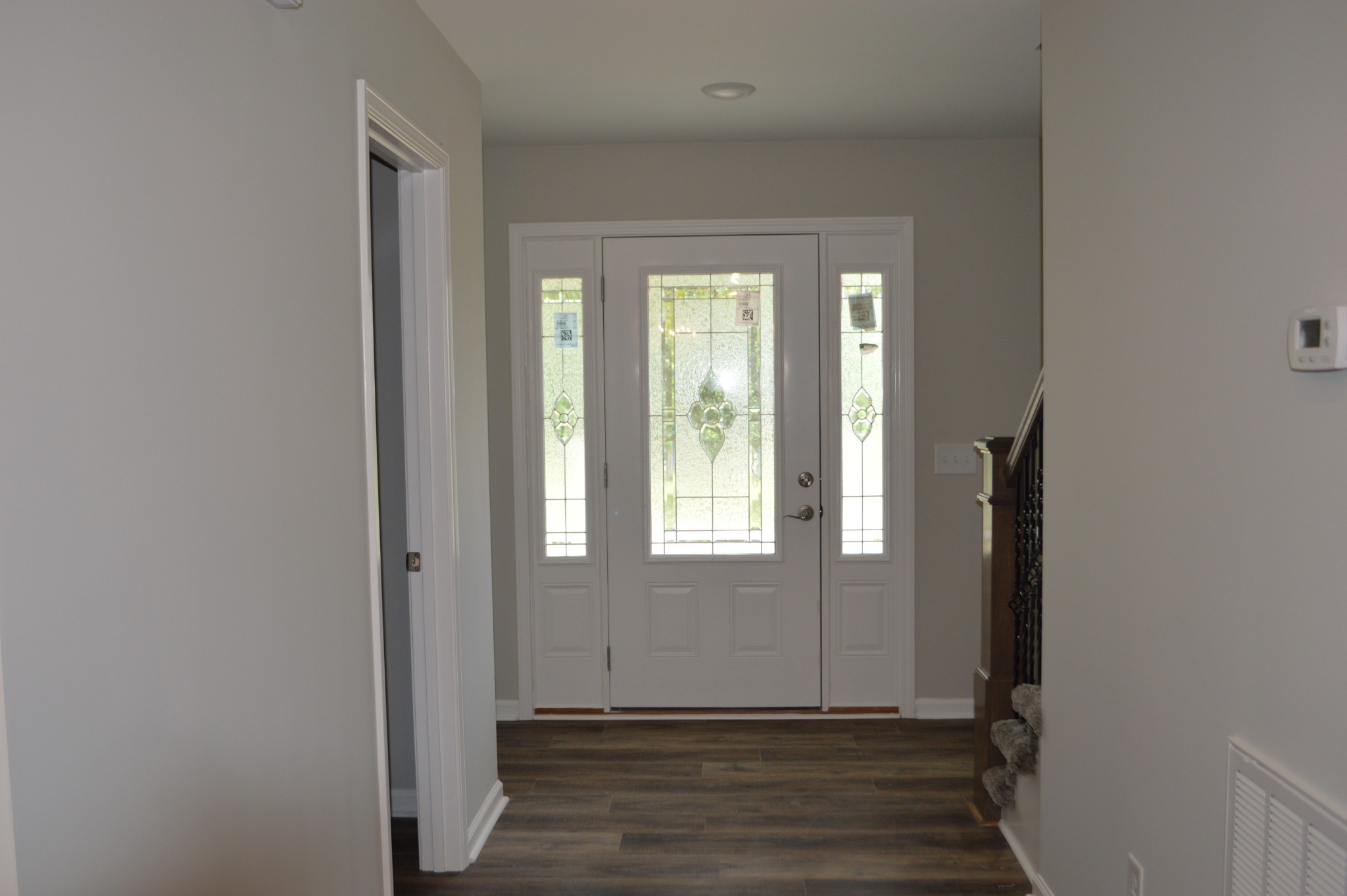 7713 South Swift Road Goodlettsville, TN 37072 - Photo 6 of 18 a view of an entryway with wooden floor and a window