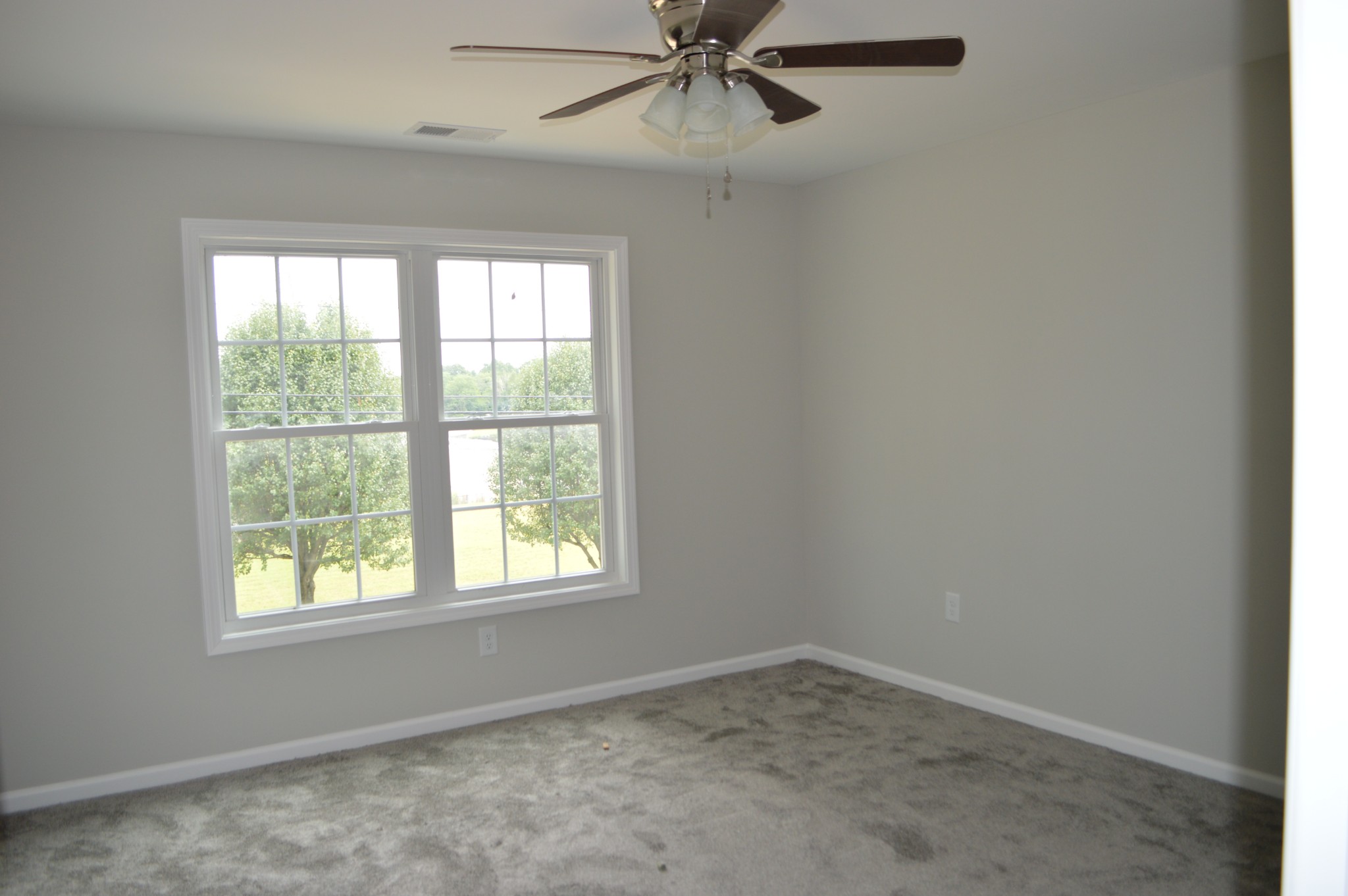 7713 South Swift Road Goodlettsville, TN 37072 - Photo 9 of 18 an empty room with a window