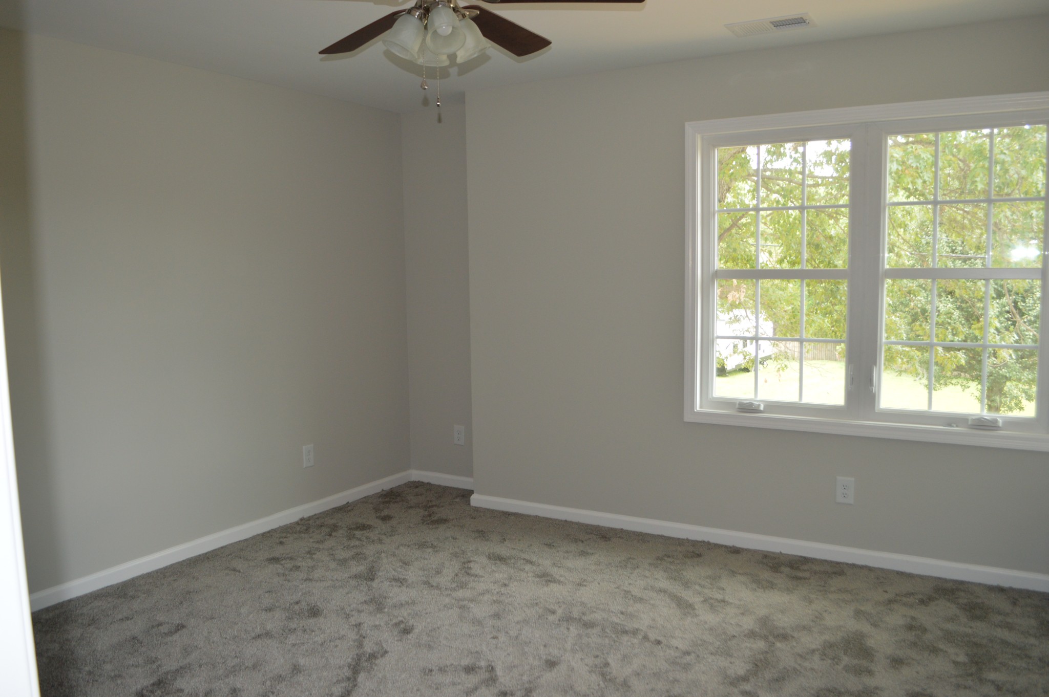 7713 South Swift Road Goodlettsville, TN 37072 - Photo 10 of 18 an empty room with a window