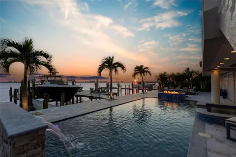 a view of a dining room with furniture and window
