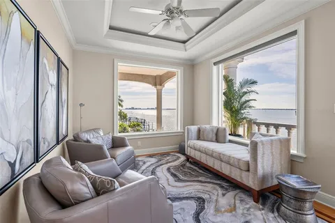 a view of a dining table and chairs in the patio