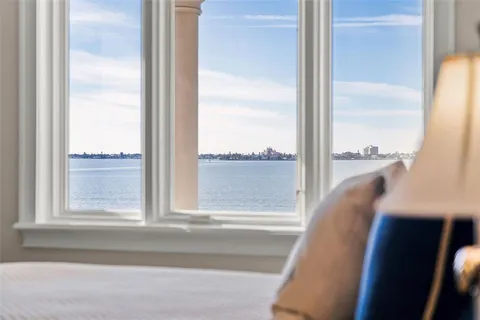 a view of a chair and table in the balcony
