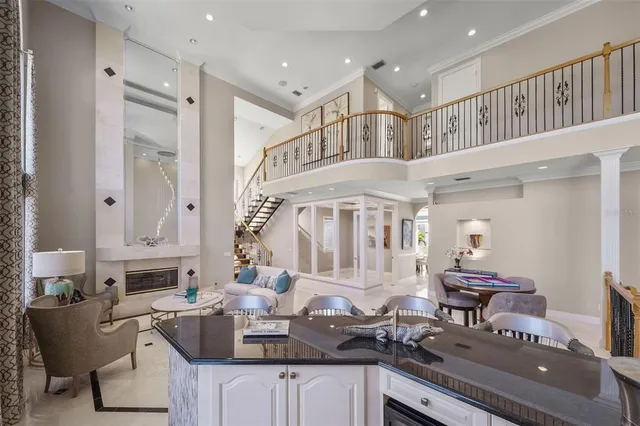 a couple of chairs that are sitting in a backyard