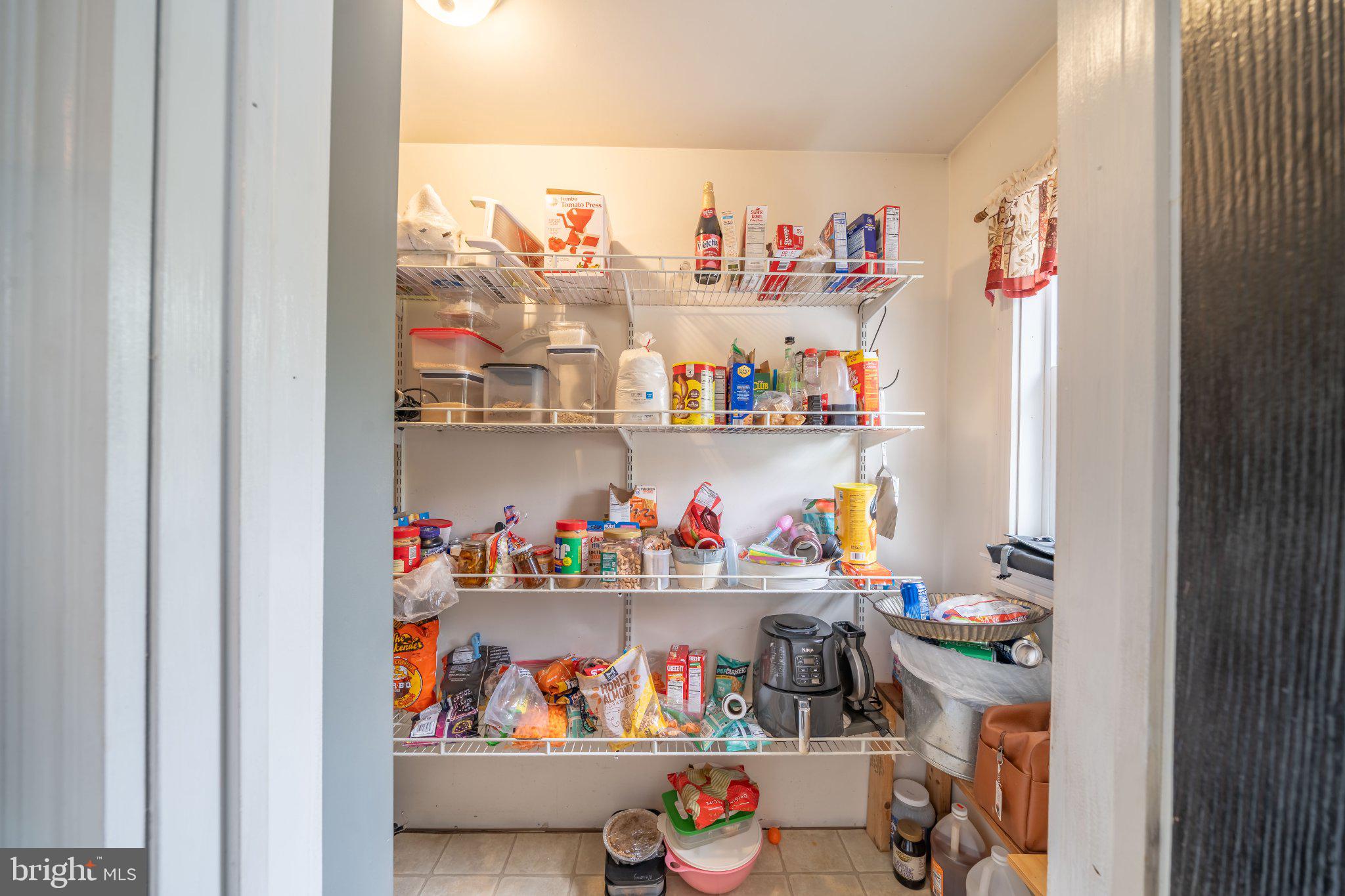 2201 Blain Road Loysville, PA 17047 - Photo 14 of 89 Organized pantry brimming with goods.