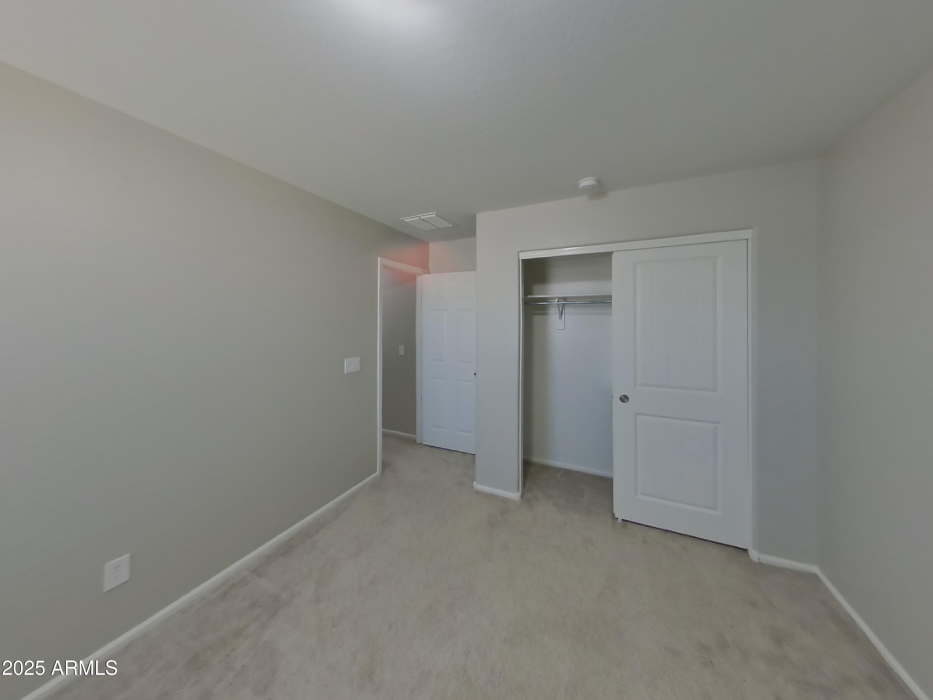 3513 South 89th Avenue Tolleson, AZ 85353 - Photo 13 of 19 a view of an empty room