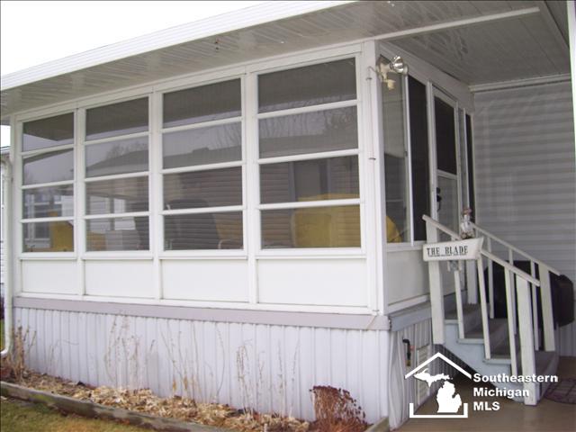 414 Midlands Temperance, MI 48182 - Photo 16 of 20 OUTSIDE VIEW- PORCH