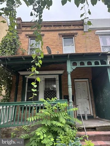 front view of house with a yard
