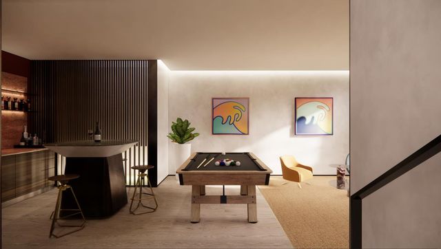 a living room with furniture a rug and a window