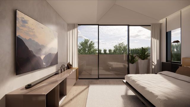 a view of a kitchen with a sink a fireplace and a window