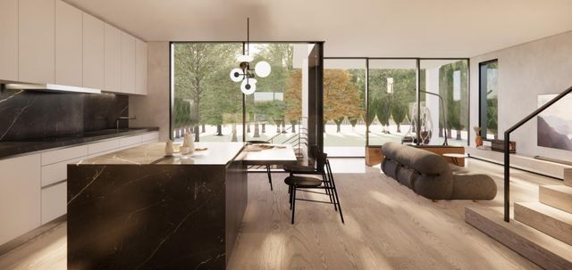 a living room with couches a coffee table and a flat screen tv