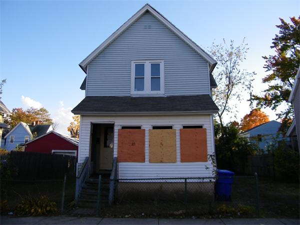 25 Ladd Street Springfield, MA 01109 - Photo 1 of 3 a view of a house with wooden fence