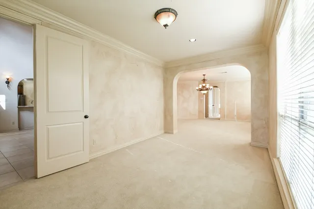 a bathroom with a granite countertop sink mirror and a bathtub