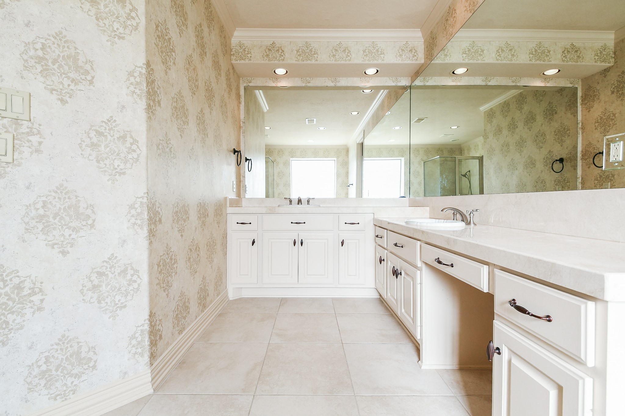 2014 Flower Garden Lane Houston, TX 77077 - Photo 20 of 32 a spacious bathroom with a granite countertop sink mirror and a