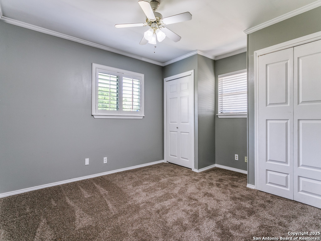 249 Ralston Drive Converse, TX 78109 - Photo 17 of 25 a view of an empty room with window and closet area