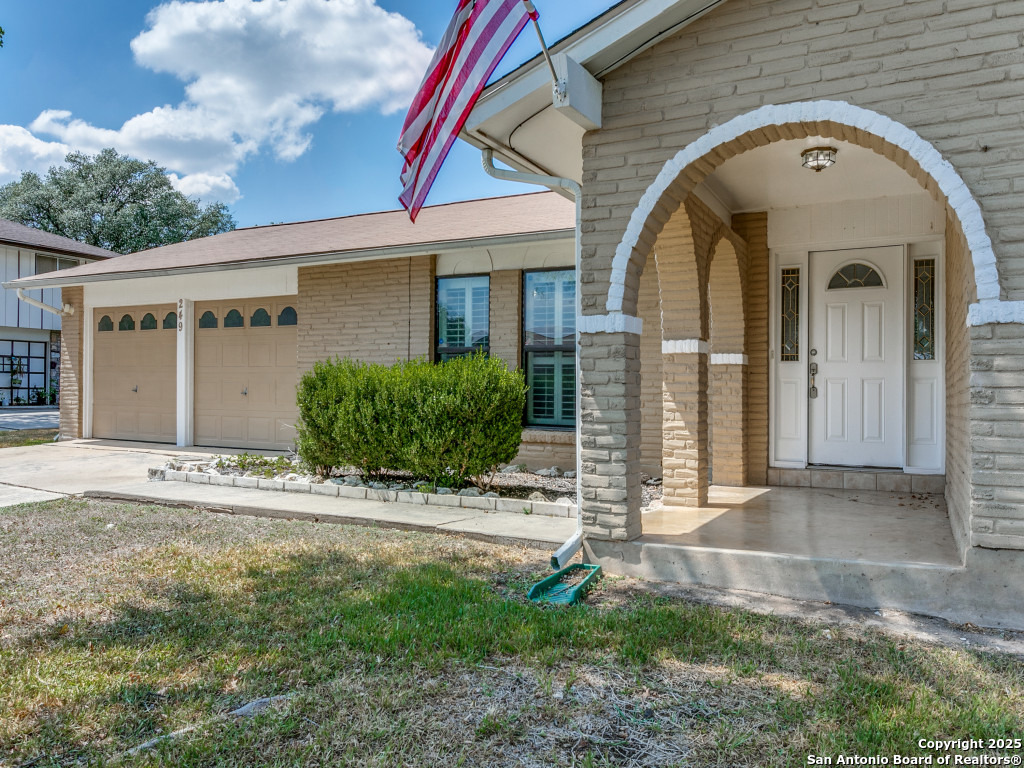 249 Ralston Drive Converse, TX 78109 - Photo 2 of 25 a front view of a house with garden