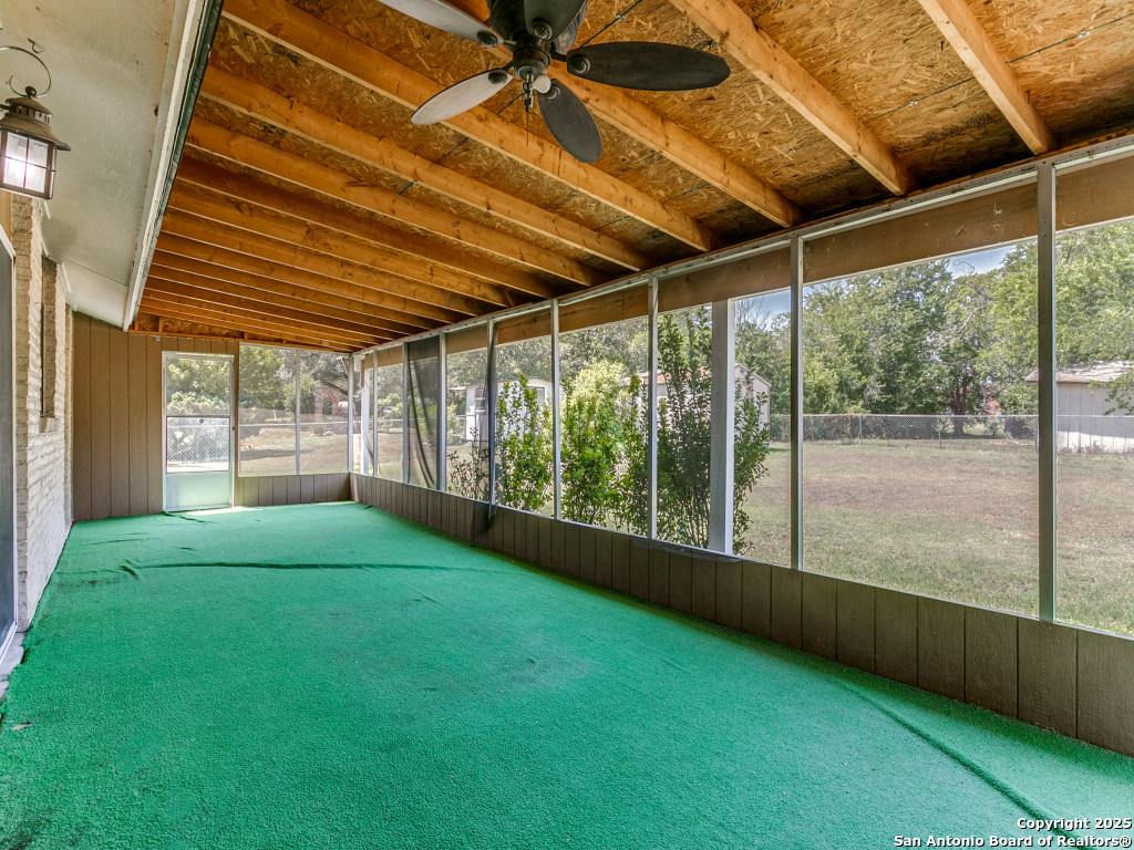 249 Ralston Drive Converse, TX 78109 - Photo 21 of 25 a view of an empty room with a window and balcony