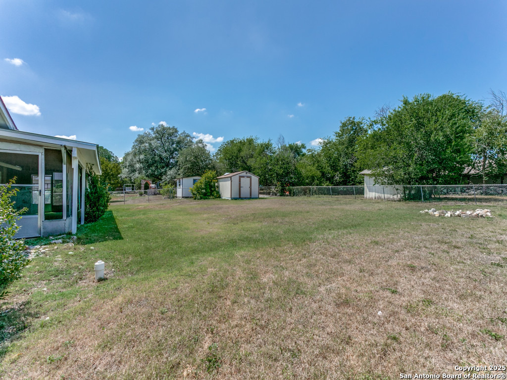 249 Ralston Drive Converse, TX 78109 - Photo 22 of 25 a view of a backyard with a garden