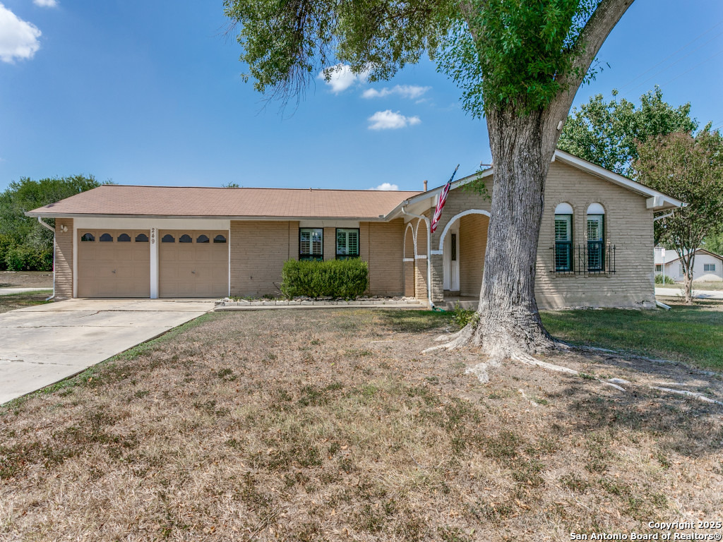 249 Ralston Drive Converse, TX 78109 - Photo 25 of 25 a front view of a house with garden
