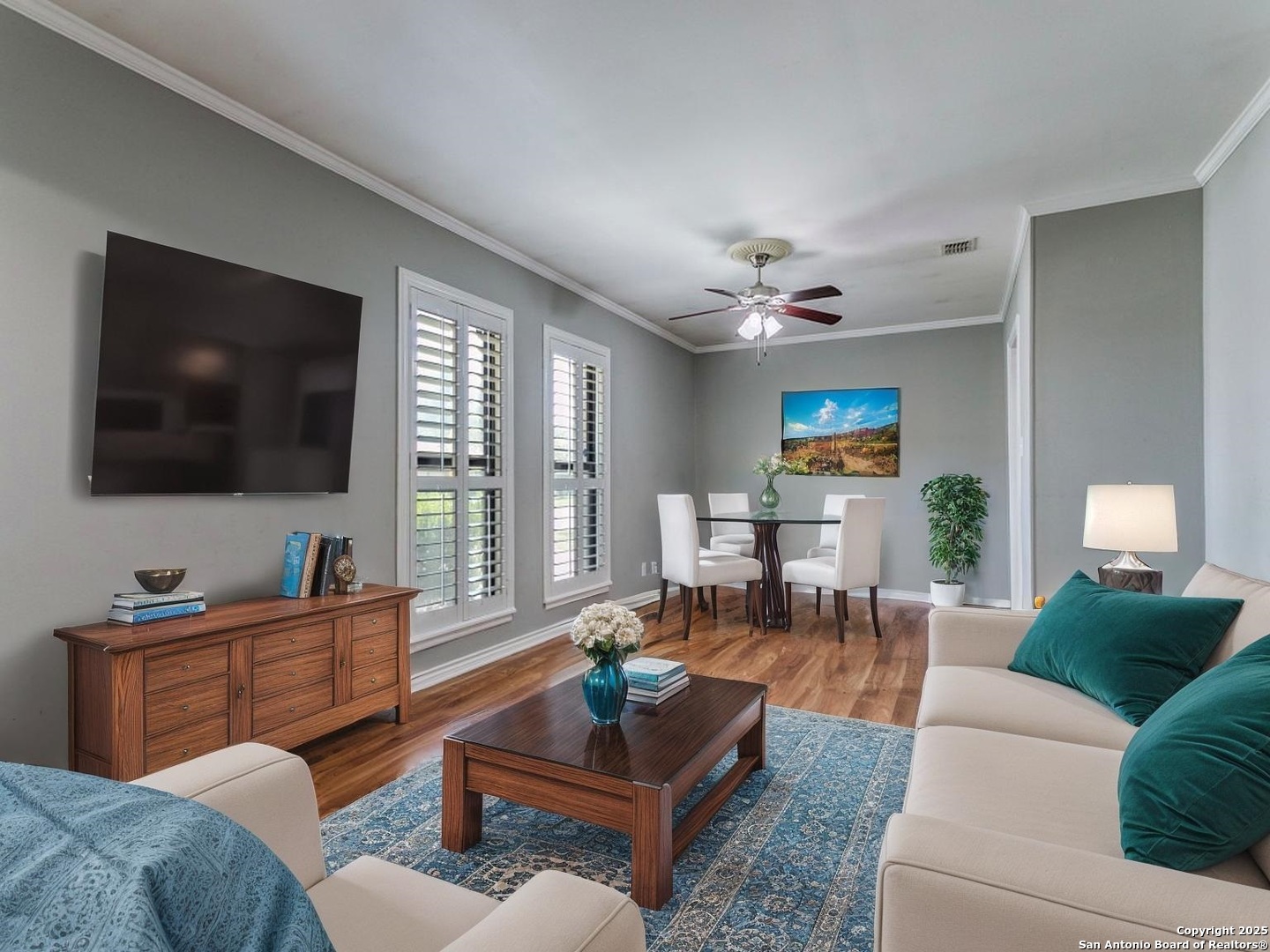 249 Ralston Drive Converse, TX 78109 - Photo 6 of 25 a living room with furniture and a flat screen tv