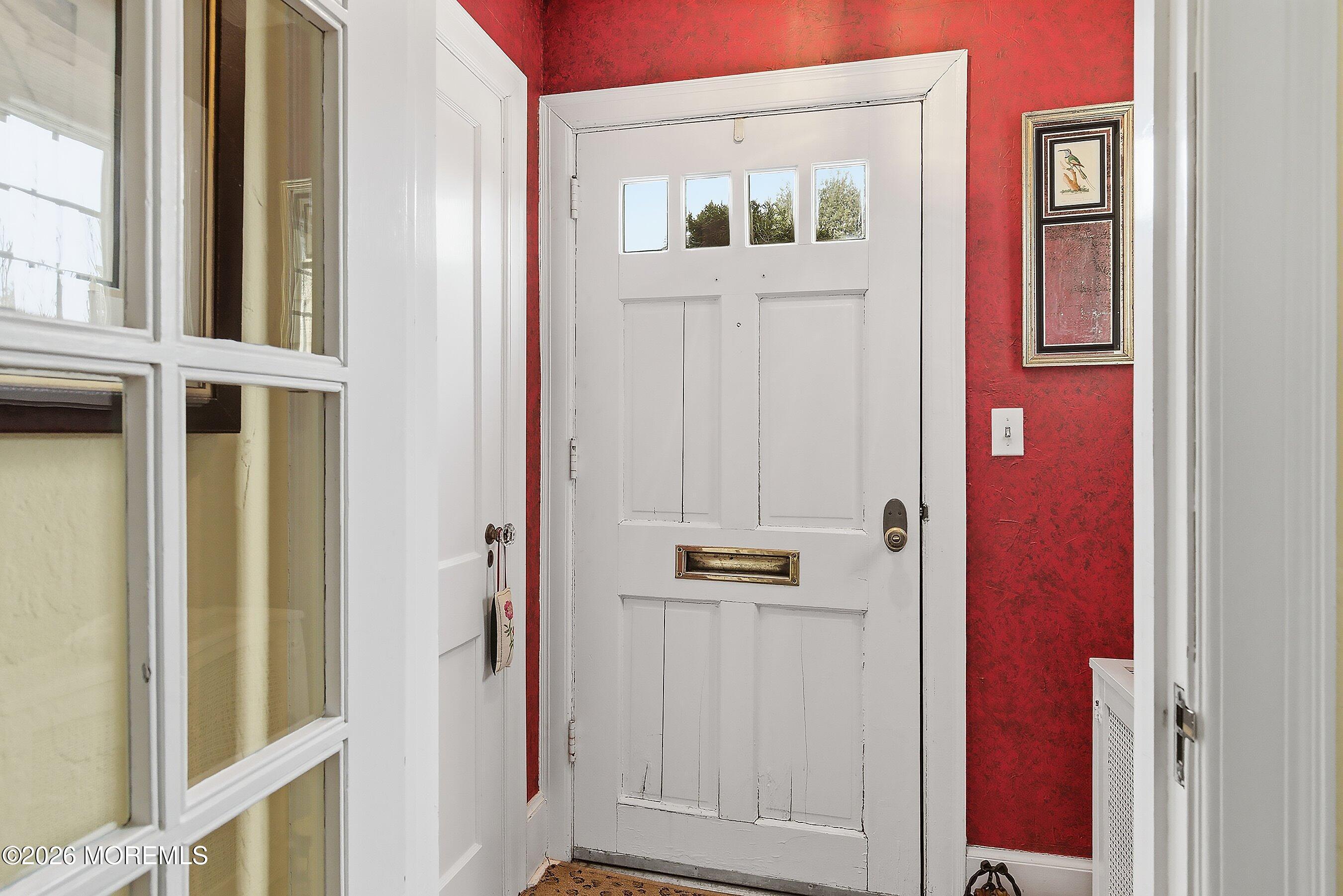 607 Cherokee Lane Brielle, NJ 08730 - Photo 11 of 64 a view of front door with wooden floor