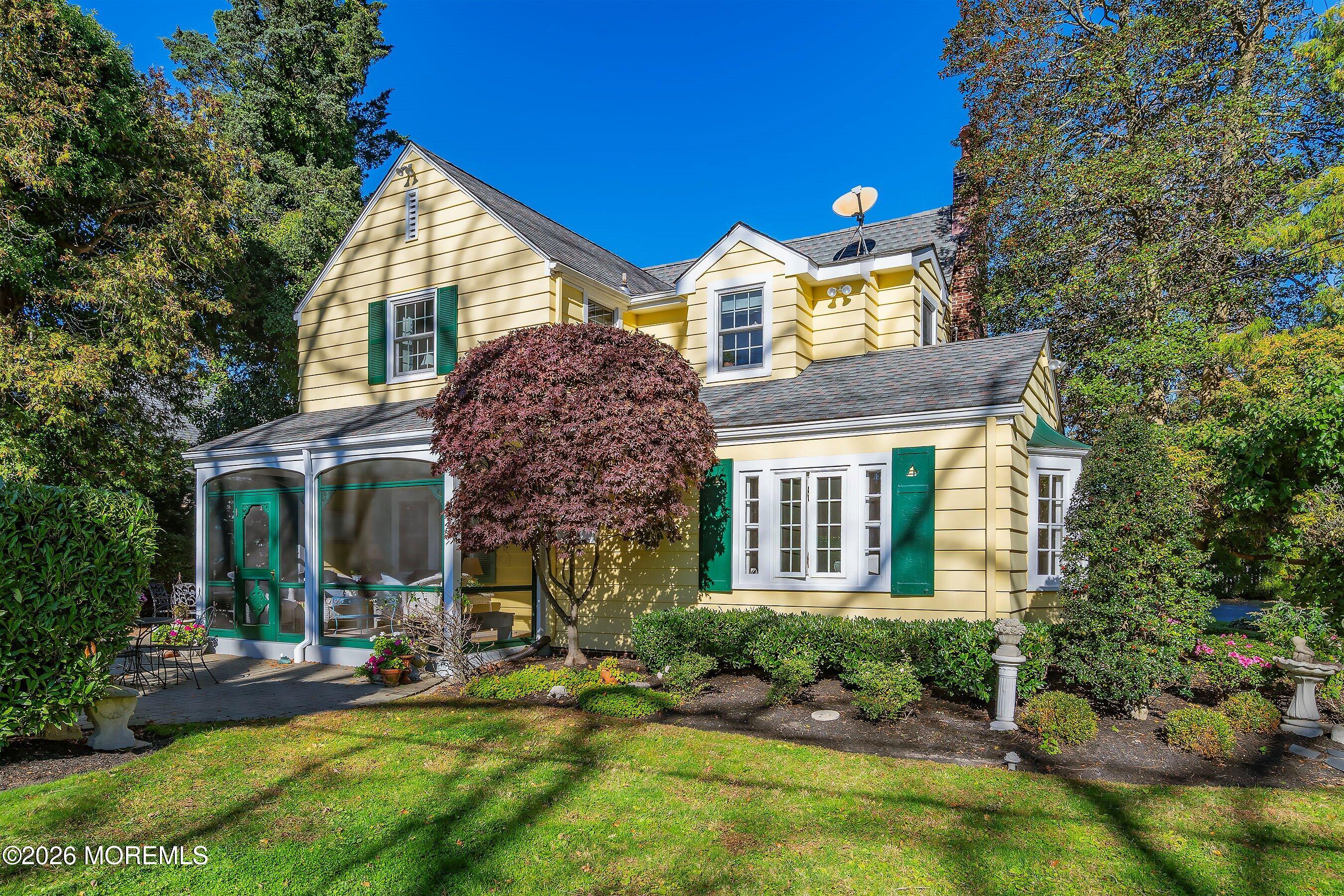 607 Cherokee Lane Brielle, NJ 08730 - Photo 46 of 64 front view of a house with a yard