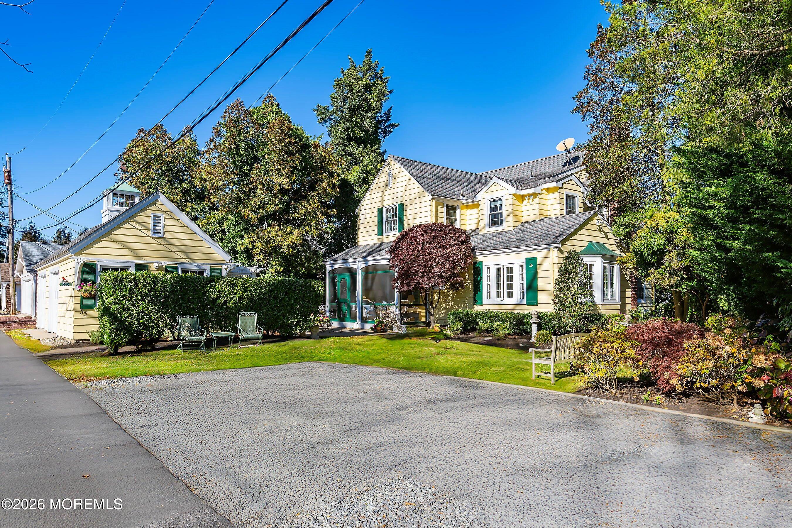 607 Cherokee Lane Brielle, NJ 08730 - Photo 56 of 64 a view of a house with swimming pool and a yard