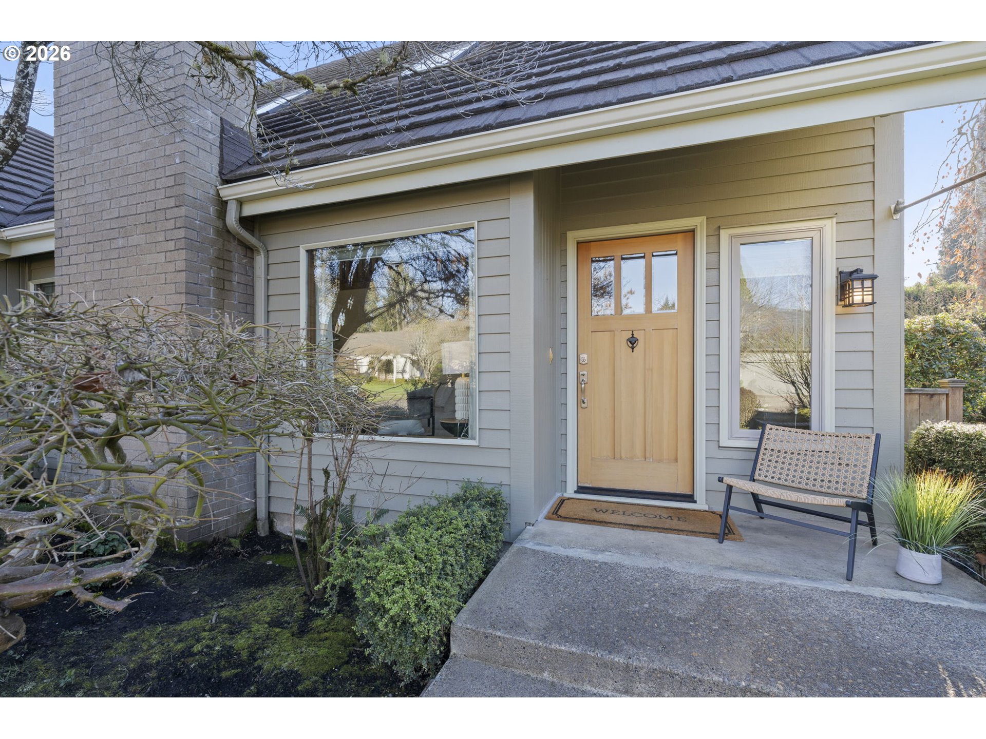 847 Fairway View Drive Eugene, OR 97401 - Photo 2 of 28 a view of a porch with furniture and floor to ceiling window
