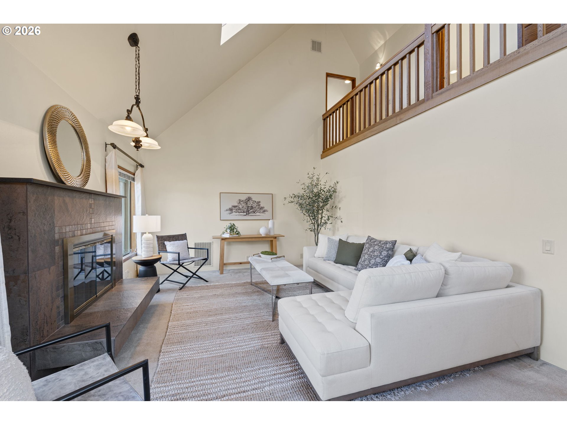 847 Fairway View Drive Eugene, OR 97401 - Photo 3 of 28 a living room with furniture a fireplace and a chandelier