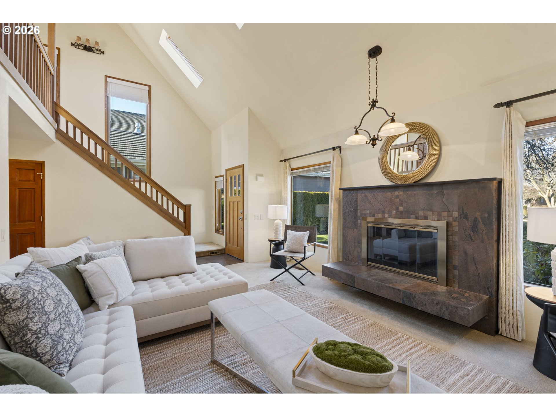 847 Fairway View Drive Eugene, OR 97401 - Photo 5 of 28 a living room with furniture a clock and a fireplace