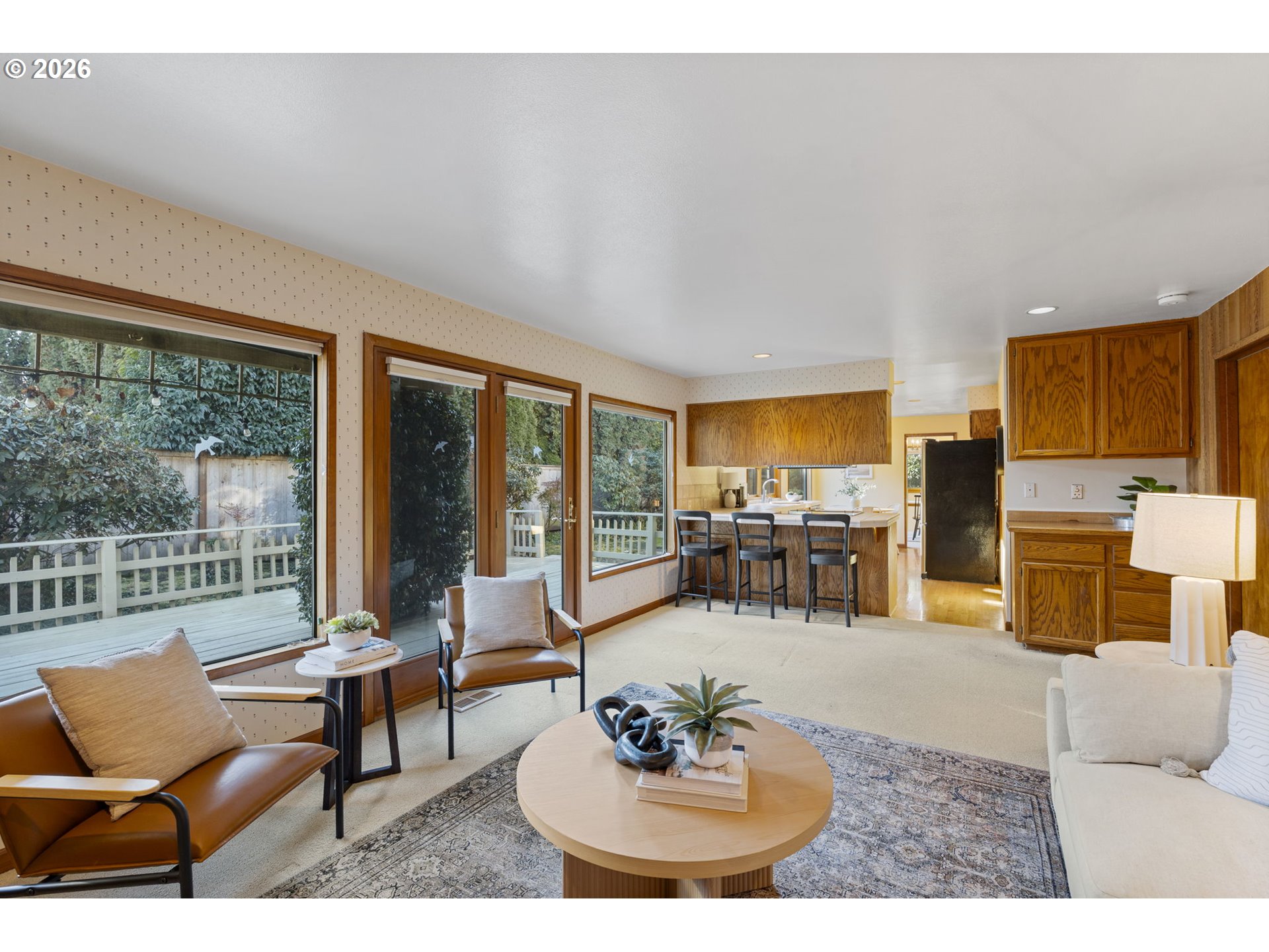 847 Fairway View Drive Eugene, OR 97401 - Photo 9 of 28 a living room with furniture and floor to ceiling windows