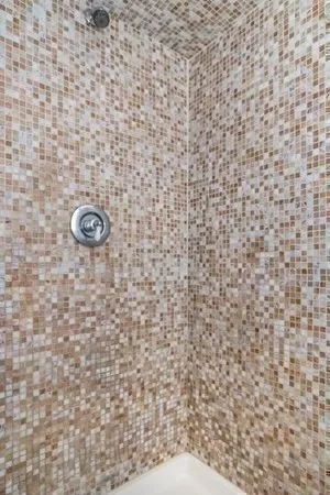 a bathroom with a white toilet