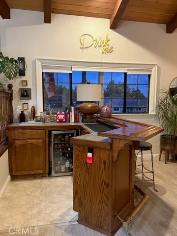 a kitchen with stainless steel appliances granite countertop a stove and cabinets
