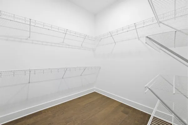 a view of a room with racks on the wall