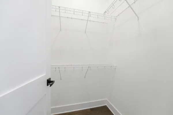 a view of a room with racks on the wall