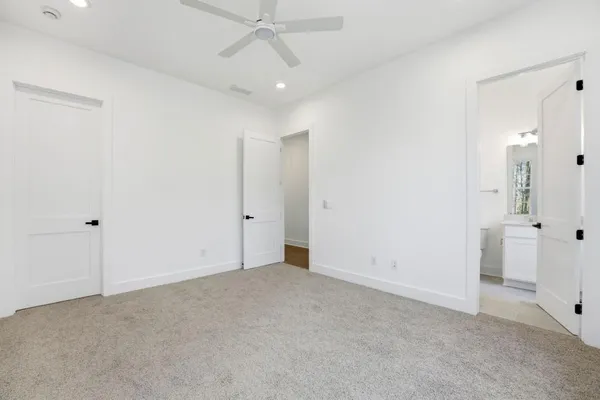 an empty room with a bathroom