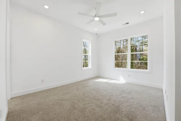 an empty room with windows