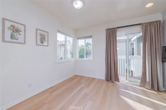 a view of a bedroom with a large window