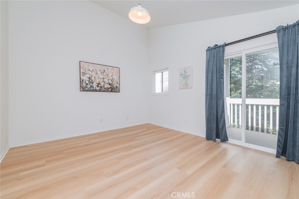 34028 Selva Road, Unit 77 Dana Point, CA 92629 - Photo 14 of 39 a view of a bedroom with a large window