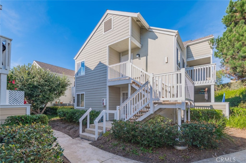 34028 Selva Road, Unit 77 Dana Point, CA 92629 - Photo 2 of 39 a view of a house with a yard
