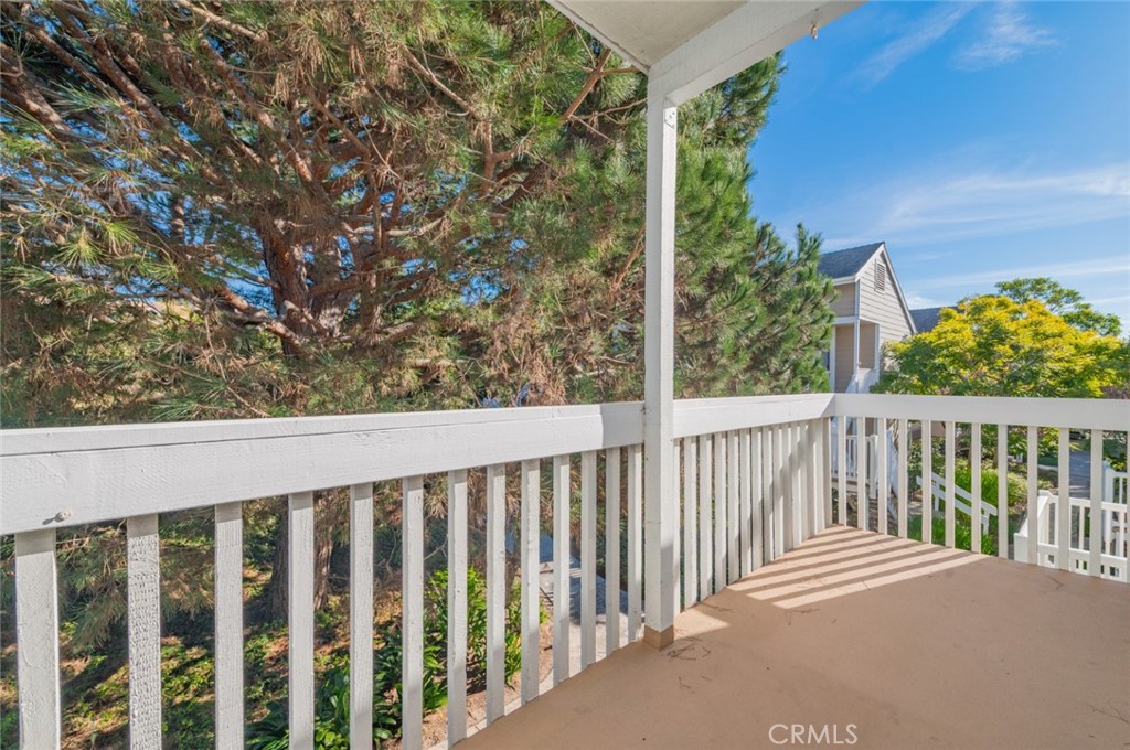 34028 Selva Road, Unit 77 Dana Point, CA 92629 - Photo 21 of 39 a view of a balcony with wooden floor