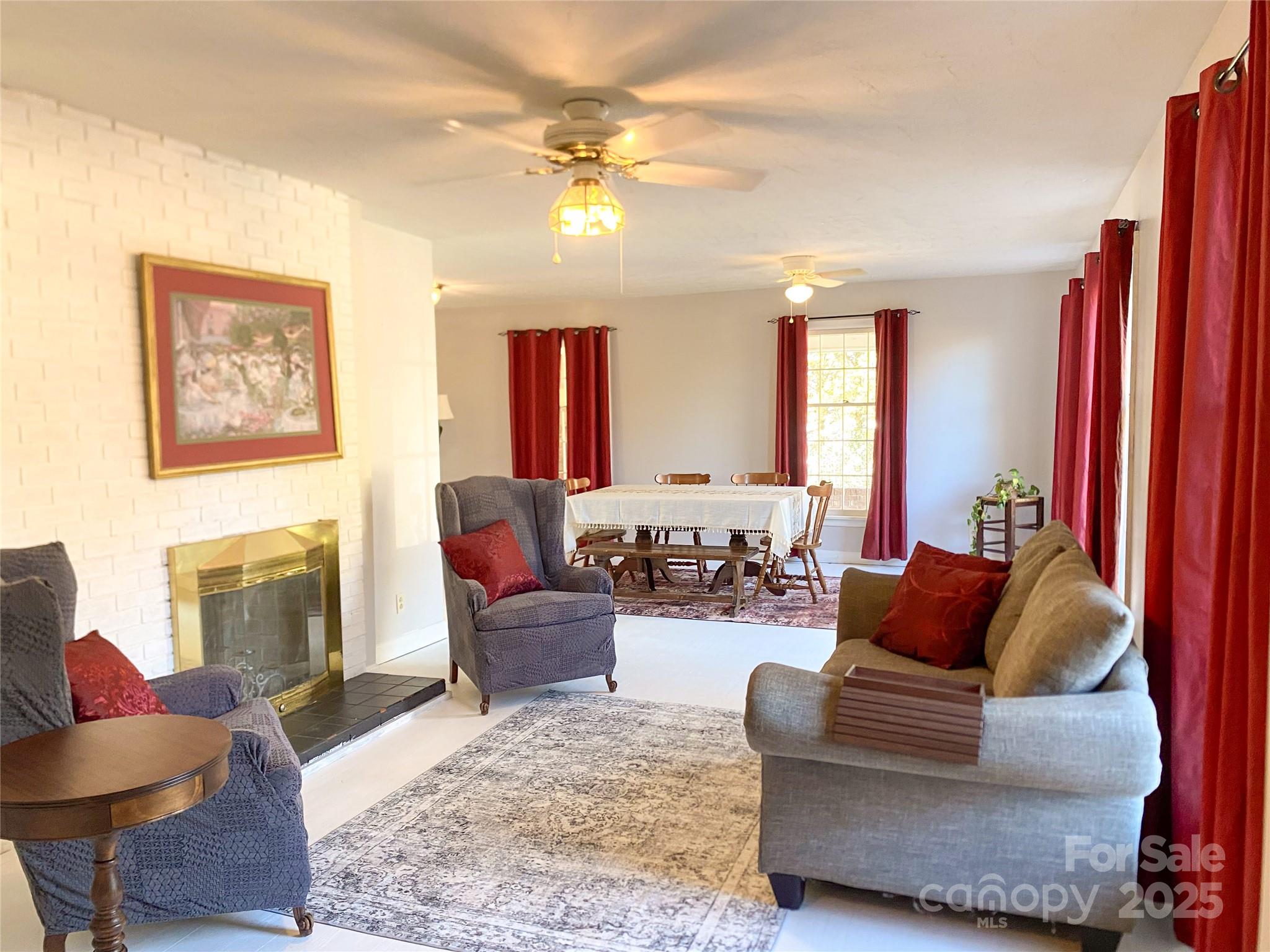2855 Gheen Road Salisbury, NC 28147 - Photo 4 of 40 a living room with furniture and a fireplace