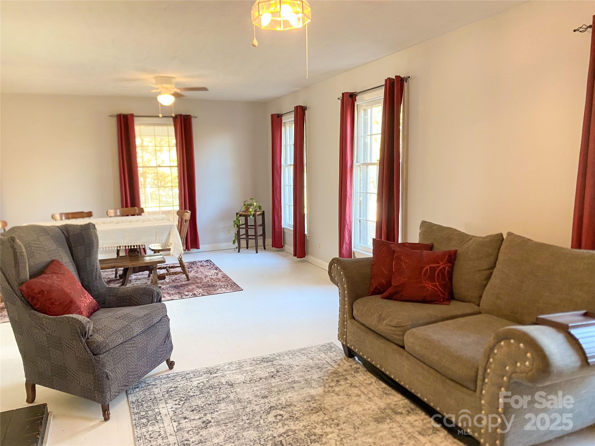 2855 Gheen Road Salisbury, NC 28147 - Photo 5 of 40 a living room with furniture and a large window