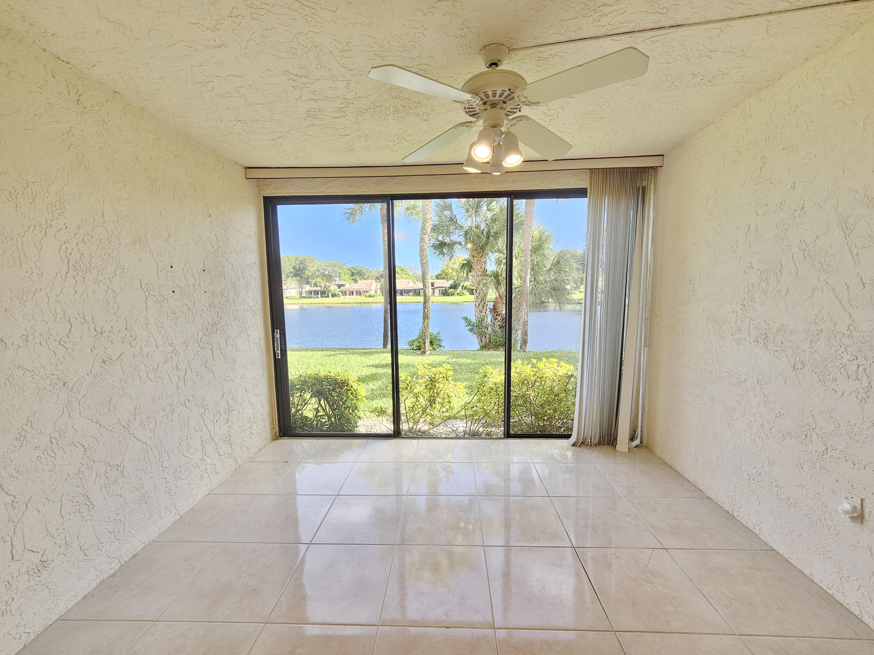 21815 Arriba Real, Unit 12E Boca Raton, FL 33433 - Photo 7 of 18 Florida Room